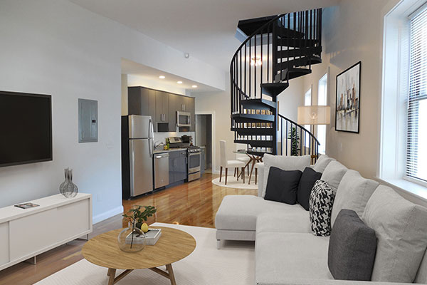 Living, kitchen and spiral staircase at 918 Cambridge St
